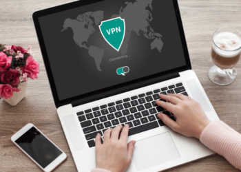 Open laptop with a VPN symbol on the screen.