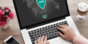 Open laptop with a VPN symbol on the screen.