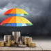 Stormy background with umbrellas over stacks of coins signifying wealth protection.